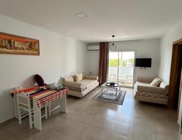 One-Bedroom Apartment with Balcony and Sea View