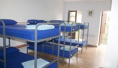 Single Bed in Dormitory Room
