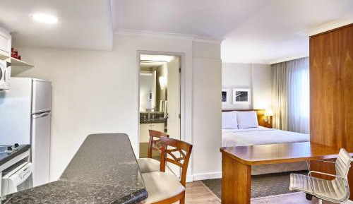 One-Bedroom Apartment with Balcony and City View