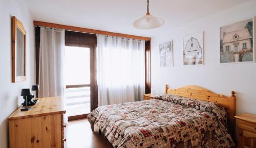 One-Bedroom Apartment with Balcony and Mountain View  