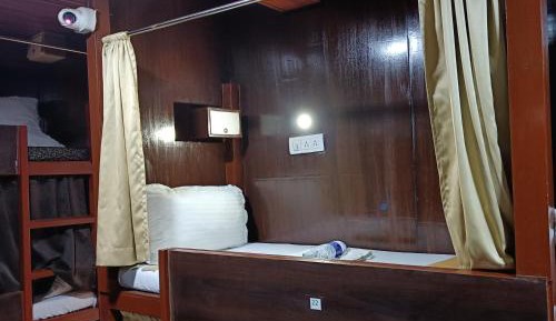 Single Bed in Dormitory Room