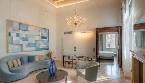 Luxury Three-Bedroom Apartment with Balcony and Canal View