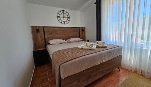 One-Bedroom Apartment with Balcony and Sea View