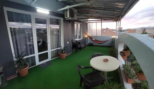 One-Bedroom Apartment with Balcony and City View