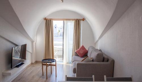 One-Bedroom Apartment with Balcony and City View