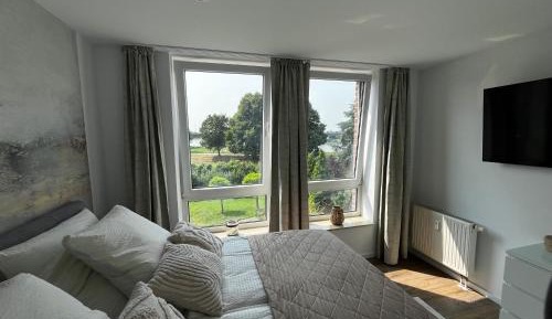 One-Bedroom Apartment with River View