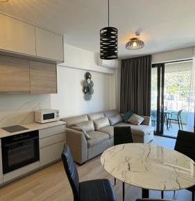 One-Bedroom Apartment with Balcony and City View