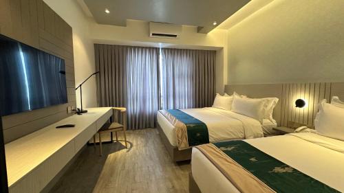 Deluxe Triple Room