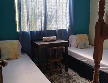 Economy Quadruple Room with Shared Bathroom