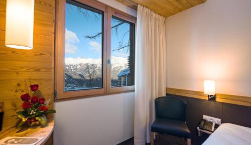 Family Room with Ski Slopes View and Balcony