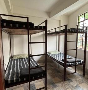 Single Bed in Dormitory Room