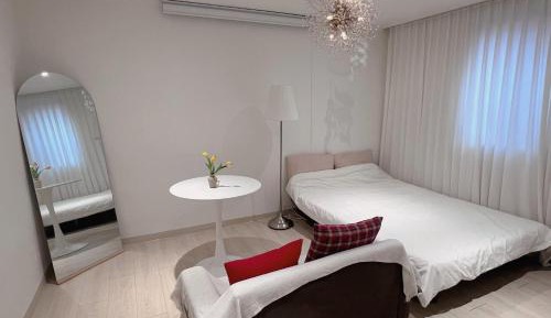 Quadruple Room with Private Bathroom