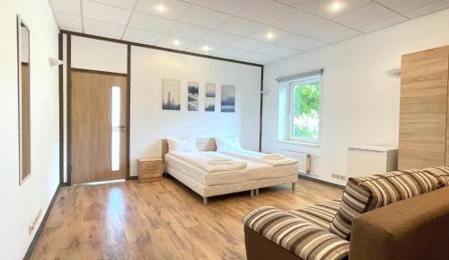 Quadruple Room with Shared Bathroom