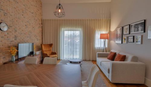 Deluxe Two-Bedroom Apartment with River View and Balcony