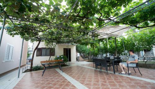 Two-Bedroom Apartment with Balcony and Garden View