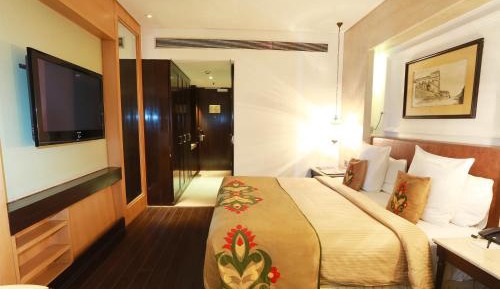 Luxury Suite - Ashok Luxury Package - Welcome drink on arrival. A soft drink and cookie platter on the day of check-in, 1 bottle of Indian wine (house brand) once during the stay, 2 hrs early check-in & late checkout 20% discount on F&B (Soft Beverages)