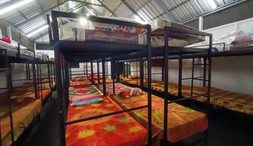Single Bed in Dormitory Room