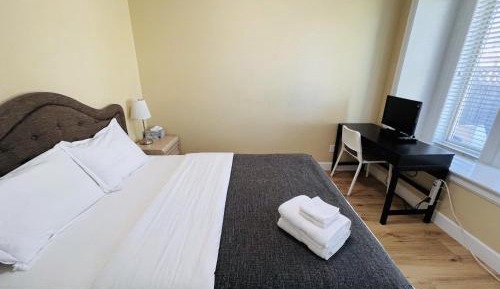Queen Room with Shared Bathroom