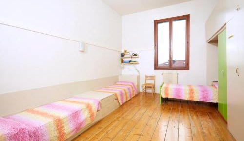Single Bed in Female Dormitory Room
