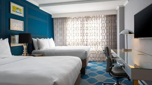 Deluxe Room with Two Double Beds and Roll-in Shower - Mobility and Hearing Accessible