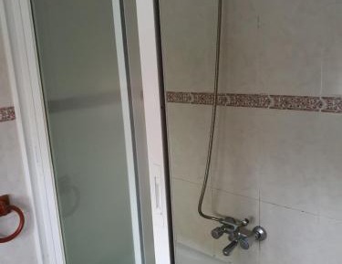Queen Room with Shared Bathroom
