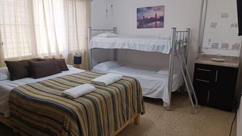 Economy Quadruple Room with Shared Bathroom