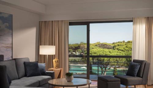 Premium Four-Bedroom Residence with Balcony and Garden View