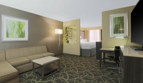 Large Executive Suite with Two Double Beds and Sofa Bed
