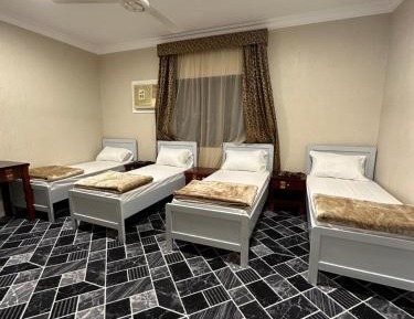 Quadruple Room with Private Bathroom