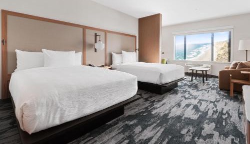 Queen Suite with Two Queen Beds and Sofa Bed