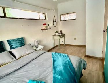 Queen Room with Shared Bathroom