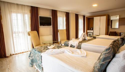 Deluxe Quadruple Room