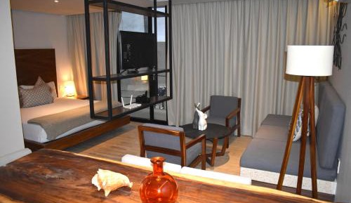 Luxury Suite with Private Balcony & Laundry Center