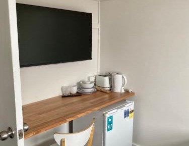 Queen Room with Shared Bathroom