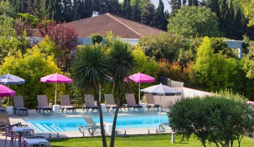Junior King Suite with Sofa Bed and Pool View