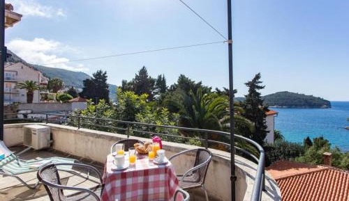 Duplex Three-Bedroom Apartment with Balcony and Sea View