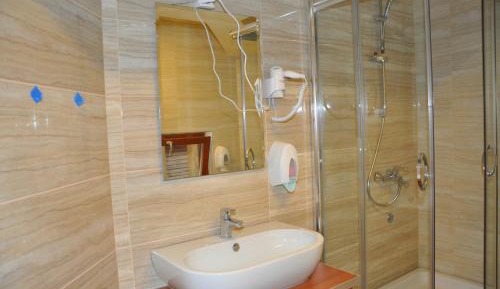 Quadruple Room with Private Bathroom