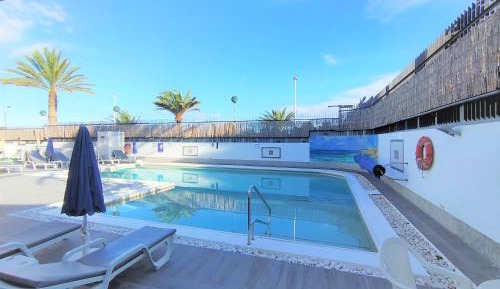 One-Bedroom Apartment with Pool View Exterior