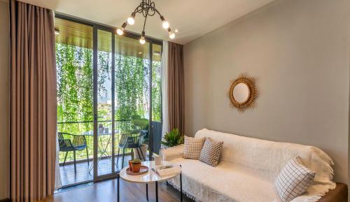 Four-Bedroom Apartment with Balcony 