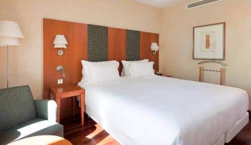 Family Adjoining Room (3 Adults + 1 Child)
