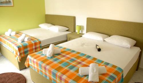 Comfort Quadruple Room with Balcony and Garden View