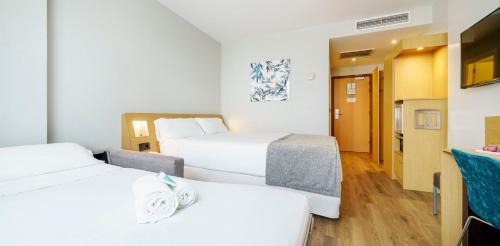 Triple Room (2 Adults + 1 Child)