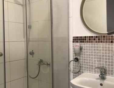 Quadruple Room with Private Bathroom