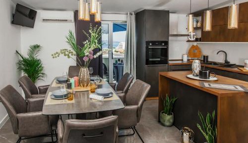 Three-Bedroom Apartment with Balcony and Sea View