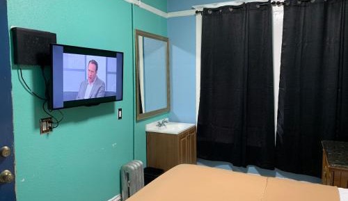 Double Room with Shared Hallway Bathroom