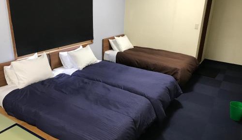 Quadruple Room with Private Bathroom