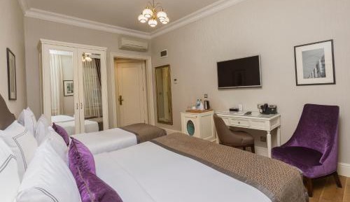 Deluxe Triple Room