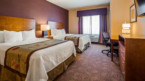 Queen Suite with Two Queen Beds and Sofa Bed