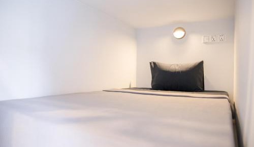 Single Bed in Dormitory Room