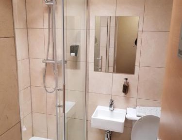 Single Room with Shared Shower and Toilet